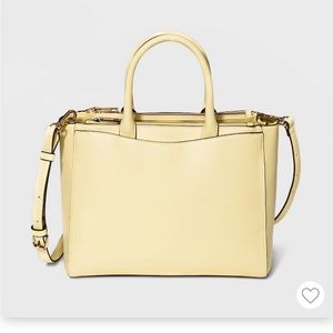 Yellow target purse